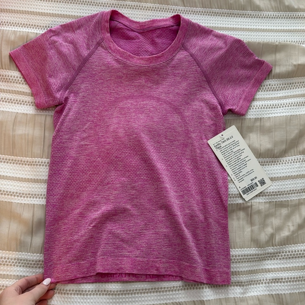 Pink lululemon swiftly tee size 4